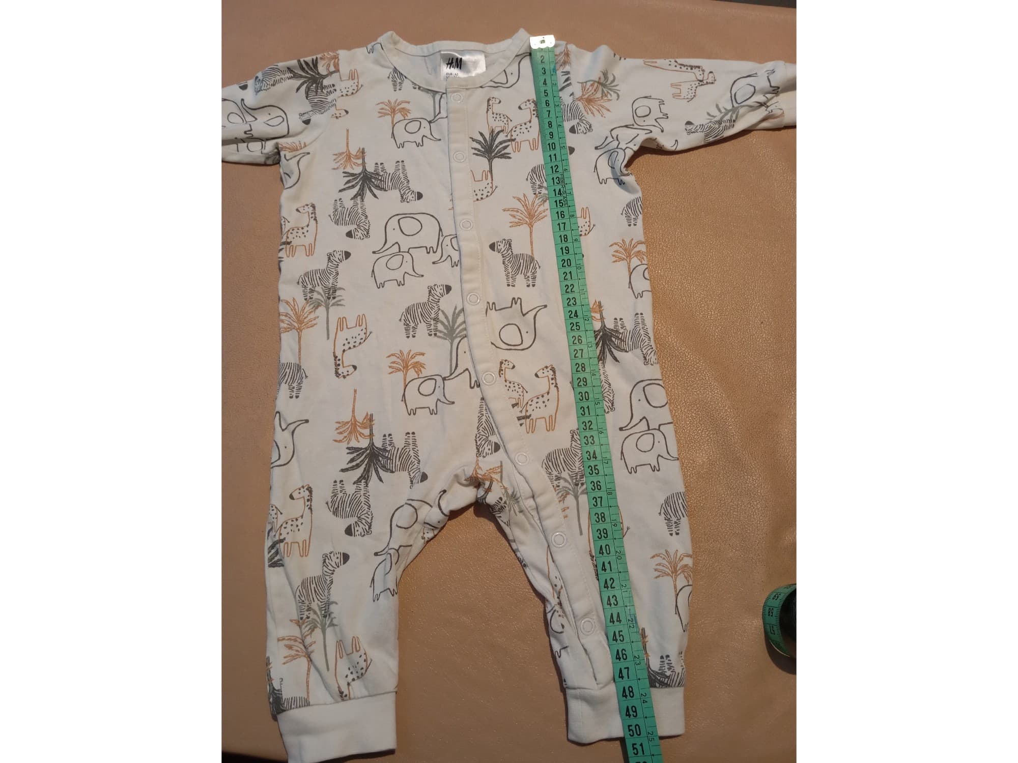 Body de bebe H & M. Manga larga, sin pie